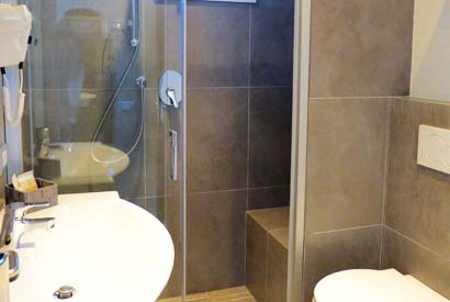 The bathroom in the deluxe rooms